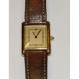 A 'Must de Cartier' by Cartier unisex 'Tank' wristwatch, silvered dial,