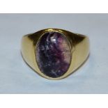 A Blue John flourite signet ring, oval cabochon blue john panel, approx 15.5mm x 10.3mm x 4.