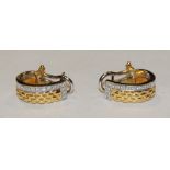 A pair of Italian diamond accented two tone cuff earrings,