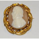 A large unusual cameo depicting a distinguished gentleman in military dress mounted in a scrolling