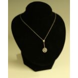 A diamond pendant necklace, central round brilliant cut diamond approx 0.