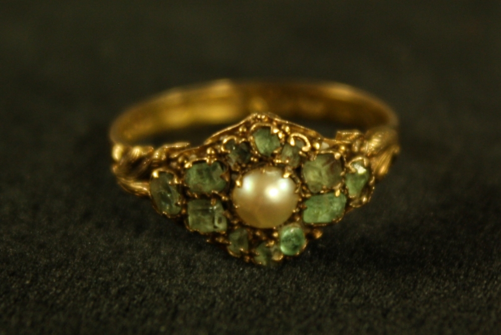 A 19th century half pearl and pale green stone cluster ring,