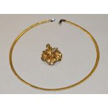 An Italian Orchid pendant necklace, shaped Orchid pendant with five stone diamond accented stamen,