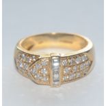 A David Morris diamond encrusted buckle ring,