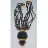 Eileen Coyne - a gold mounted ruby and green zoisite necklace,