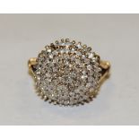 A diamond conical pyramid cluster ring, six stepped conical cluster crest,