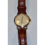 Longines - a vintage 1960s Flagship automatic 9ct gold cased wristwatch, textured silver dial,