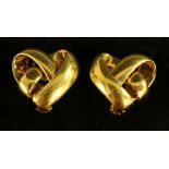 Van Cleef & Arpels - a pair of 18ct gold tied ribbon heart earrings, marked VCA NY 3 K854-5 and -6,