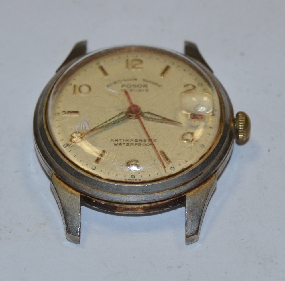 Posor - a vintage watch head, textured dial, alternating Arabic numeral and bar baton markers,