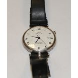 A J & T Windmill silver cased wristwatch, white dial, Roman numerals, centre seconds, date aperture,