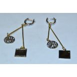 Bugari - a pair of double drop earrings,