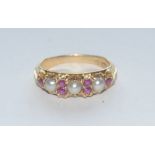 A Victorian ruby and half pearl line ring,