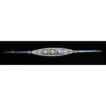 An Art Deco style diamond and seed pearl bar brooch,