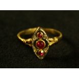 An Art Deco style ruby and diamond navette cluster ring,