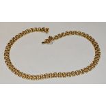 An Italian 14ct gold arched brick link necklace, compression clasp, safety loop,