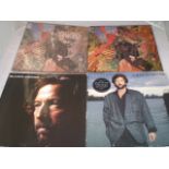 2 SANTANA AND 2 ERIC CLAPTON ALBUMS