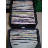 2 CASES OF SINGLES INC ROLLING STONES AND JOHN LENNON