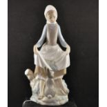 LLADRO FIGURINE OF GIRL WITH RABBIT CURTSEYING,