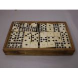 SET OF EBONY AND BONE DOMINOES