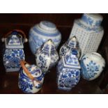 9 ITEMS OF ORIENTAL STYLED BLUE AND WHITE JARS,