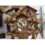 CUCKOO CLOCK WITH PENDULUM AND WEIGHTS