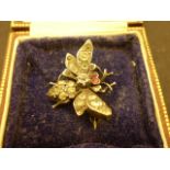 WHITE METAL BELIEVED TO BE PLATINUM AND WHITE STONE FLY BROOCH STAMPED 900