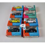 8 CORGI LONDON TAXI MODELS BOXED