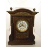 AN OAK CASED LIBRARY CLOCK WITH BROCOT MOVEMENT,