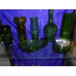 7 PIECES OF GREEN GLASS TO INCLUDE DECANTER VASES AND POTS