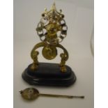 A BRASS FUSEE SKELETON CLOCK 12" TALL APPROX,