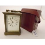 A BRASS CARRIAGE TIMEPIECE,