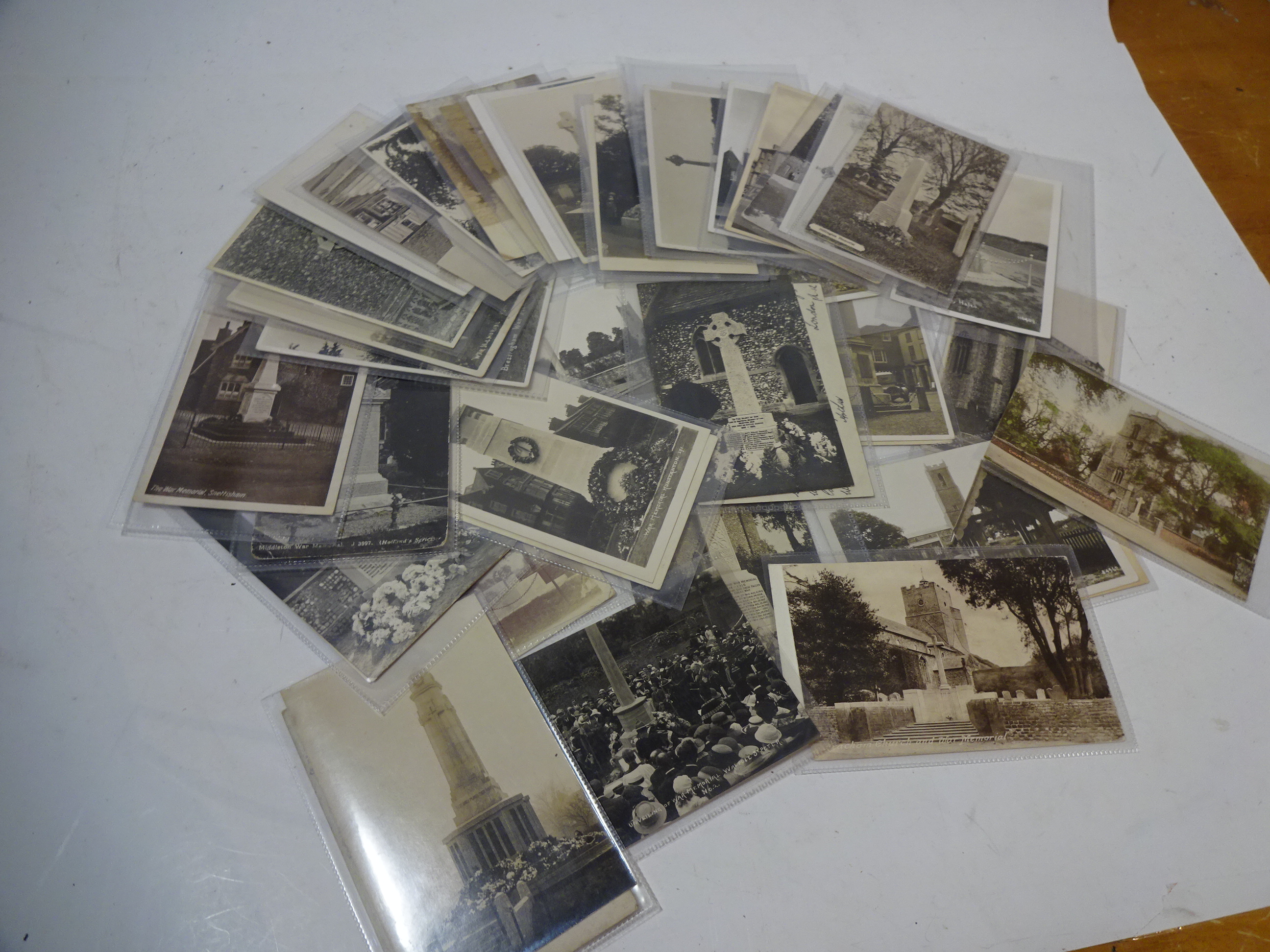 COLLECTION OF 48 MILITARY WW1 RELATED VINTAGE POSTCARDS DEPICTING THE WAR MEMORIALS AROUND NORFOLK,