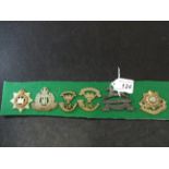 MILITARY CAP BADGES INCL THE DEVONSHIRE REGIMENT (SLIDER), THE SUFFOLK REGIMENT (SLIDER),