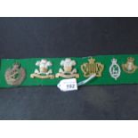 MILITARY CAP BADGES INCL CAERNARVON AND DENBIGH YEOMANRY (SLIDER),