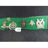 MILITARY CAP BADGES INCL ROYAL DUBLIN FUSILIERS (SLIDER), RIFLE BRIGADE (SLIDER),