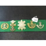 MILITARY CAP BADGES INCL SOUTH LANCASHIRE REGIMENT (SLIDER), THE WELSH REGIMENT (SLIDER),