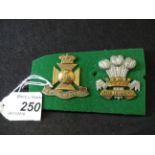 MILITARY CAP BADGES INCL THE WILTSHIRE REGIMENT (SLIDER) AND THE LEINSTER REGIMENT (LUGS) (2)