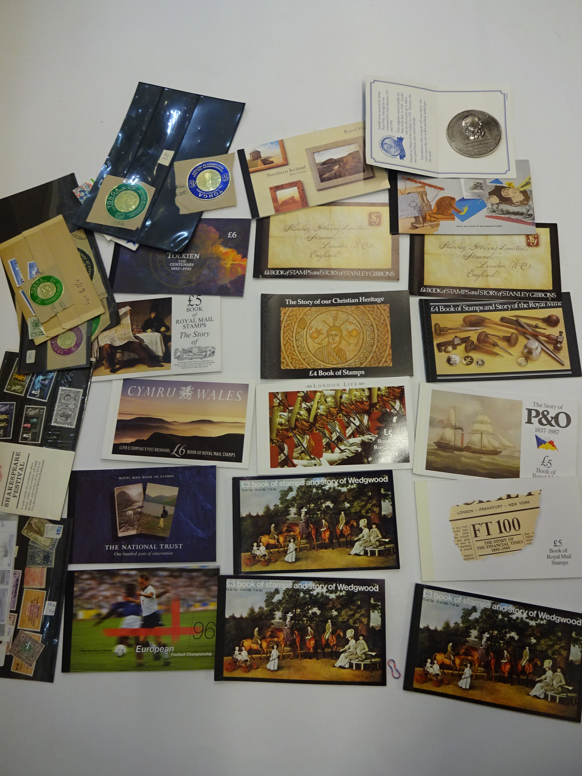COLLECTION OF STAMPS COINS 1ST DAY COVERS INCLUDING MILITARY ROYALTY FIFA ETC. SOME UNCIRCULATED.