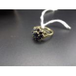 9CT GOLD RING WITH BLUE STONE CLUSTER 2g