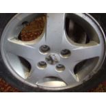 PEUGEOT ALLOY WHEEL RIM 14 INCH ( SIDEWALLS OF TYRE WILL BE CUT )