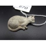 A BRUSHED SILVER BROOCH OF A CAT