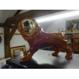 PAIR OF STAFFORDSHIRE STYLE LIONS 34CM LONG A/F