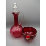 9 PIECES CRANBERRY GLASS INCLUDING PAIR OF DECANTERS