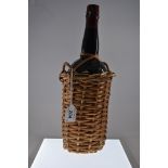 1 BOTTLE OF W & H FAMOUS SHERRY IN WICKER BASKET