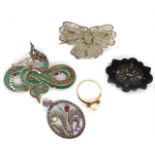 A group of three brooches, a ring and a pendant