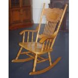 Antique style spindle back rocking chair