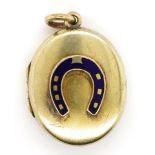 Gold and enamelled horse shoe locket