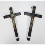 Two antique brass and wooden crucifixes