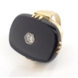 Diamond, onyx and 14ct yellow gold ring