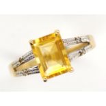 Citrine and diamond set 10ct yellow gold ring